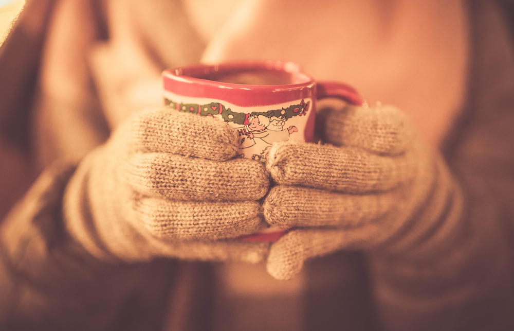 woman holding hot chocolate  