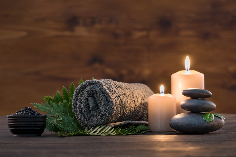 Candles, hot stones and a towel. 