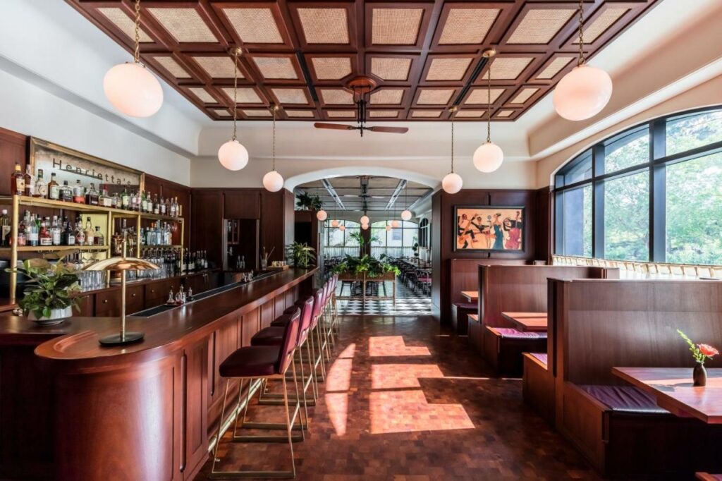 the dark wooded bar featured in the dewberry charleston, one of the best boutique hotels in Charleston