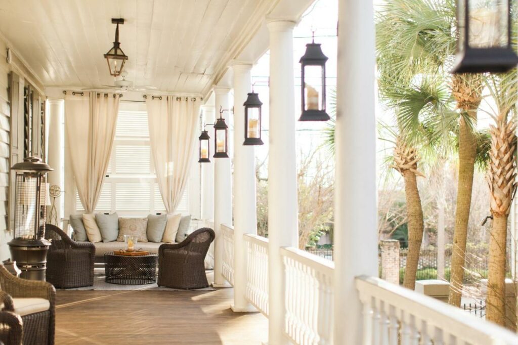 the bright, white outdoor balcony of Zero George Street, one of the best boutique hotels in Charleston