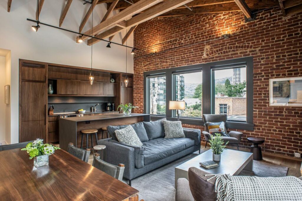 exposed brick and rich wooden accents featured in one of the best boutique hotels in Asheville