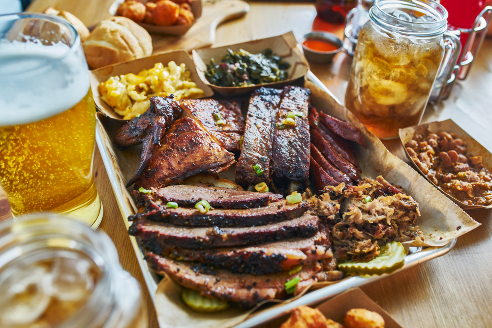 Photo of a BBQ platter and beer at Beale's Beer, one of the best breweries in Roanoke. 