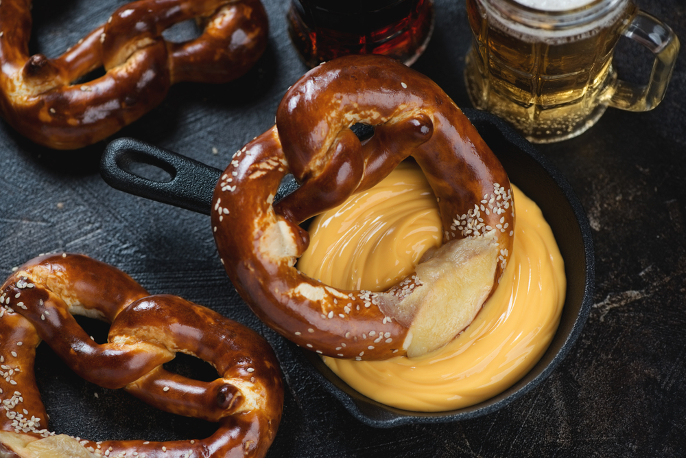Photo of a delicious pretzel and beer cheese at Twisted Track Brewpub, one of the best breweries in Roanoke. 