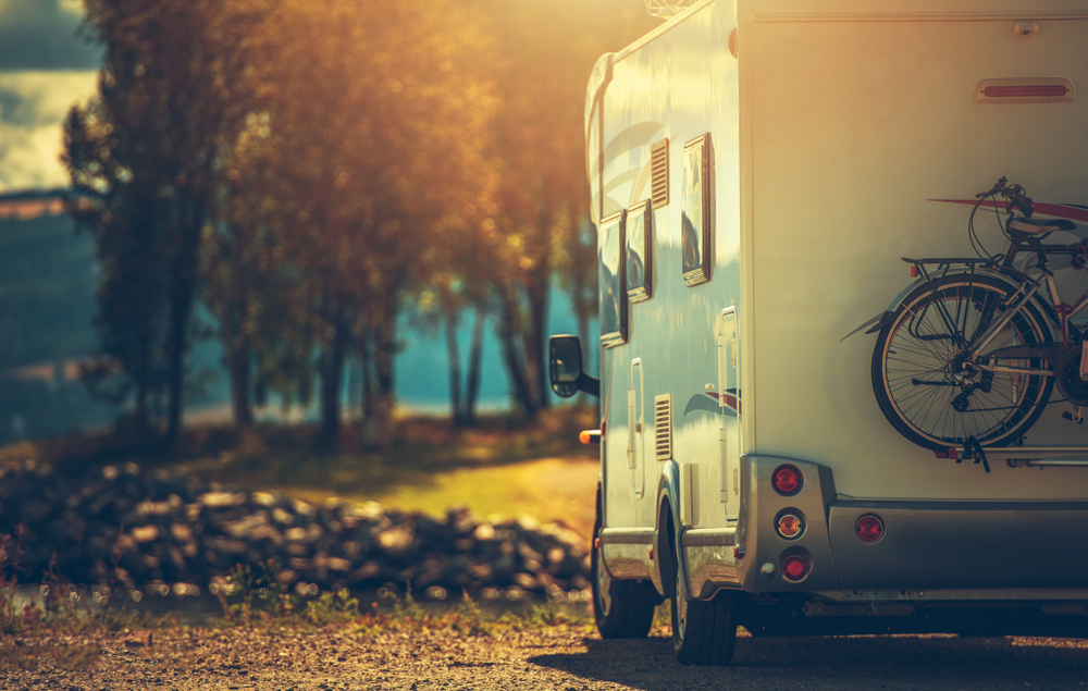 a camper parked at a campsite