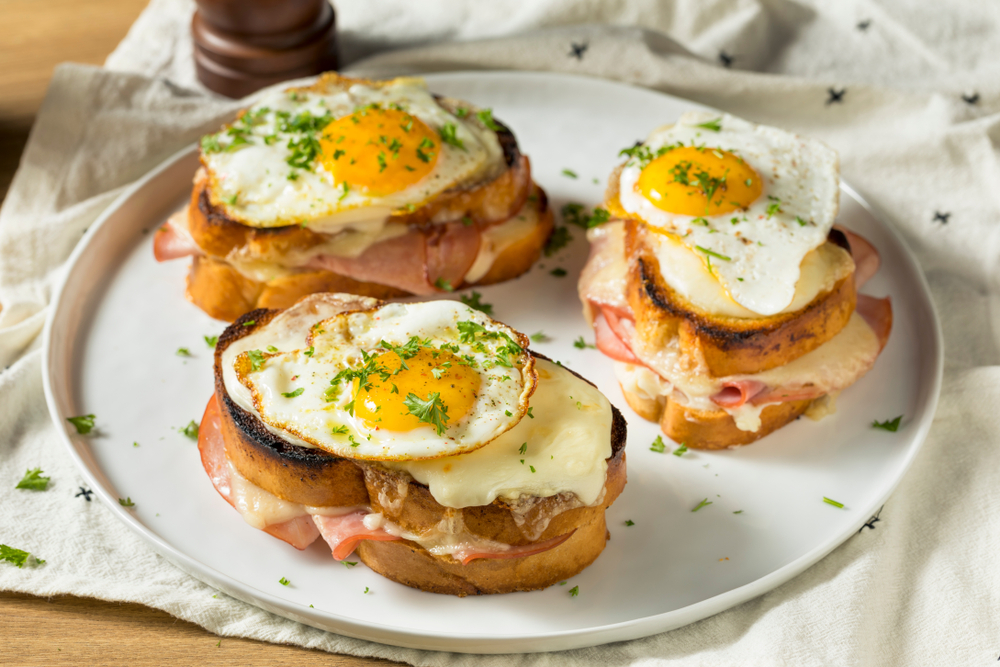 croque madame sandwiches on a plate at one of the restaurants in charlotte