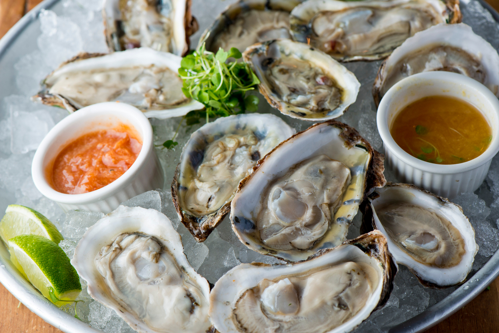 oysters on half shell on ice