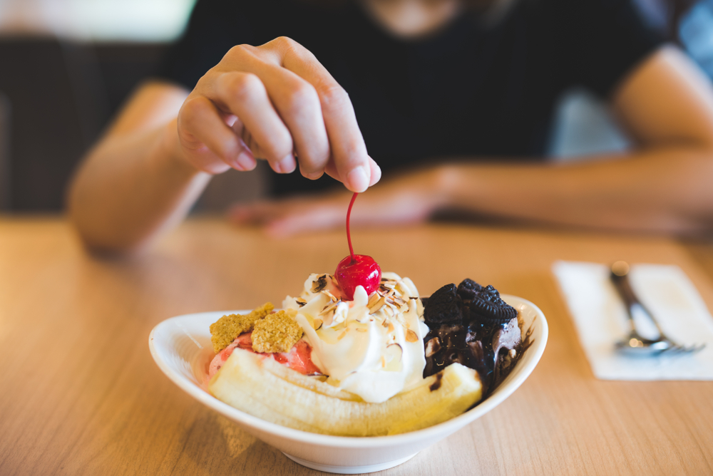 a banana split on a table