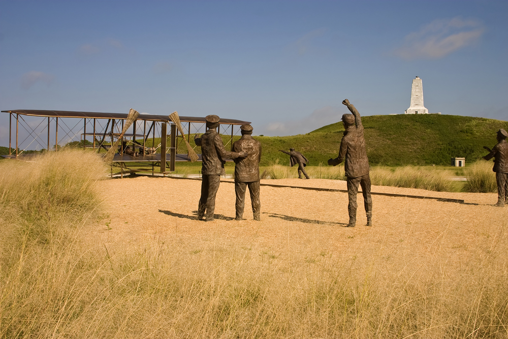 statues and other memorials at the wrights brother national memorial, one of the best things to do in kitty hawk north carolina