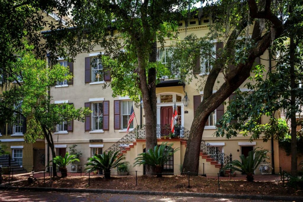 The exterior of the Eliza Thompson House, which sits on a pretty tree-lined street in Savannah.
