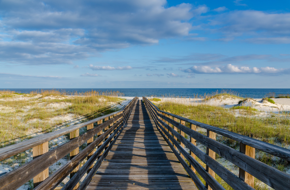 Boardwalk leading to a sandy beach on the Gulf Shores.