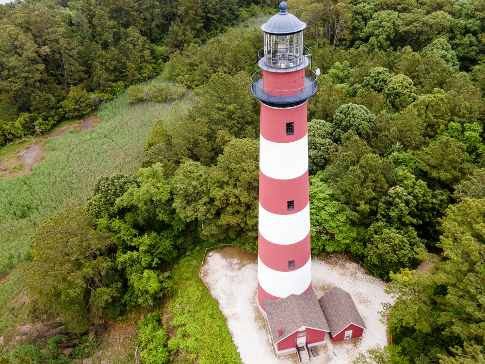 pretty red and white lighthouse on one of the best islands in Virginia Assateague Island. 