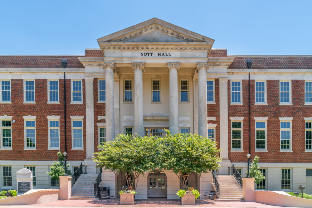 Historic Nott Hall, a brick and columned building on the UA campus.