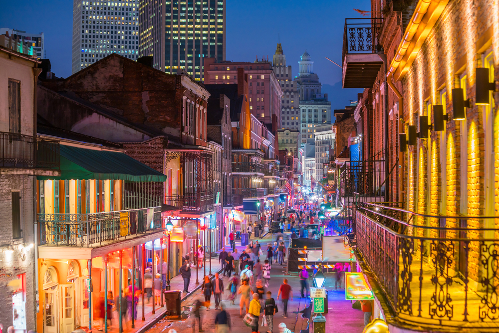The neon lights in the best neighborhood to stay in New Orleans the French Quarter 