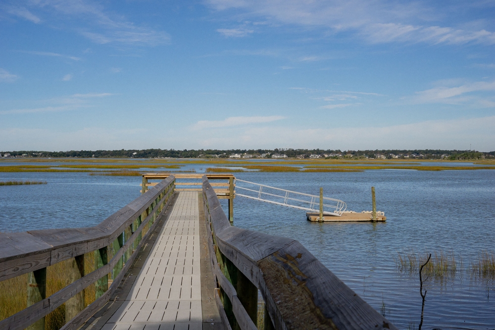dock leading out over water in emerald isle