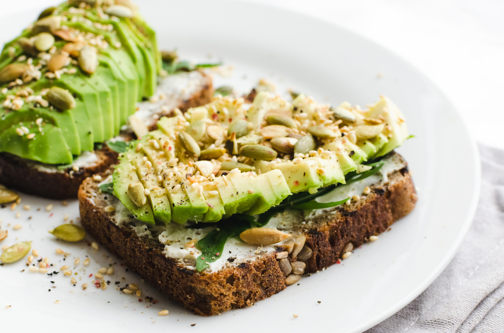 avocado toast on plate at one of the best restaurants in Louisville KY