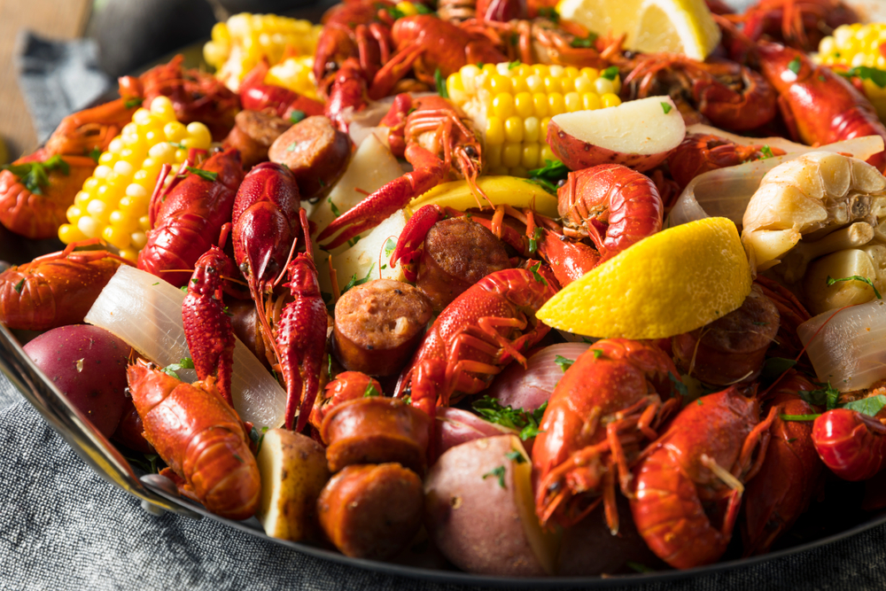 seafood boil of crawfish, potatoes, corn, and lemons