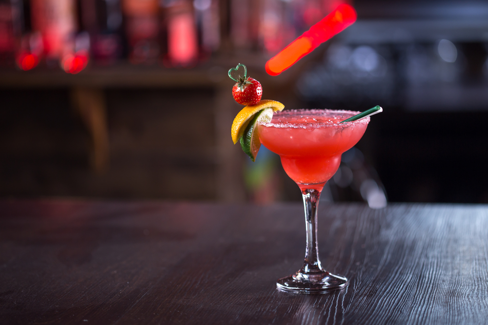 pink margarita on bar with fruit, beverage from one of the best restaurants in clarksville blackhouse pub and brewery