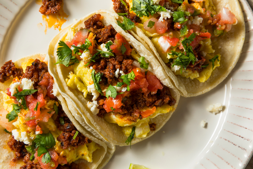 breakfast tacos on a round plate