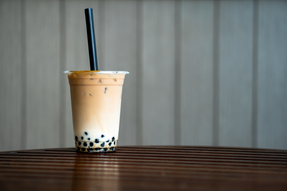 cpu of boba tea with large straw