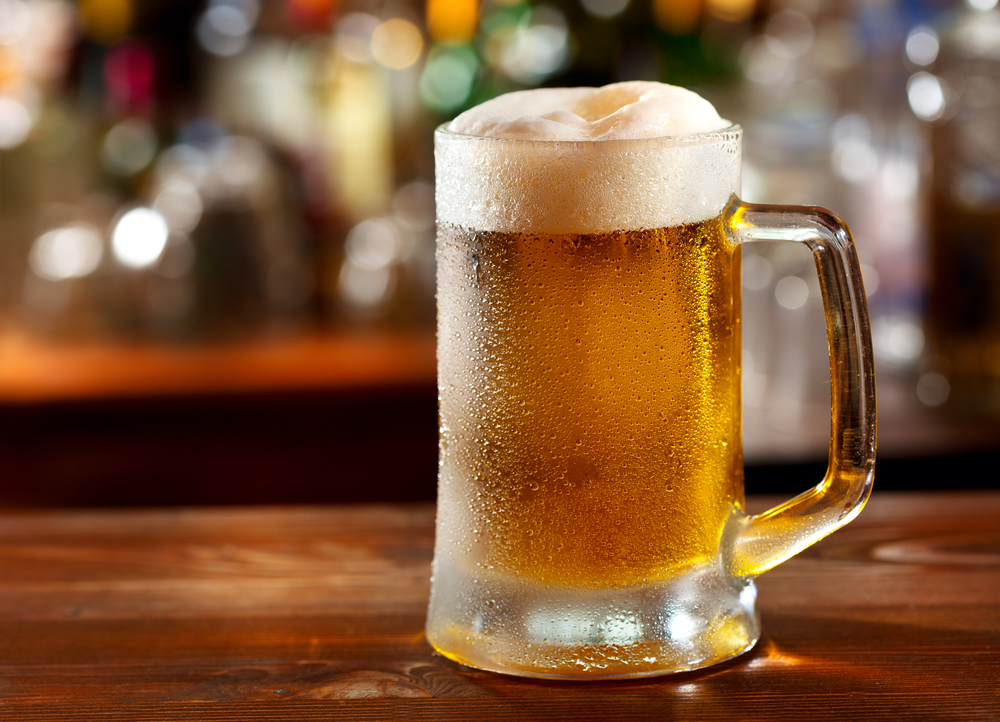 a mug of beer on the bar