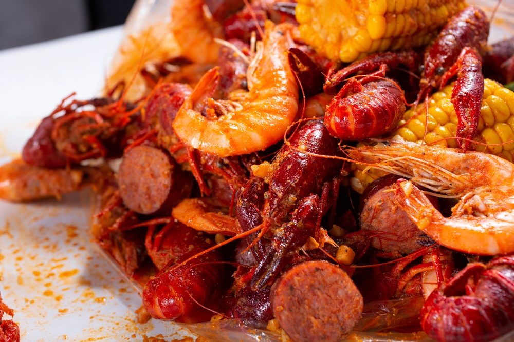 Photo of the seafood boil at The Might Crab, the best seafood in Jackson. 