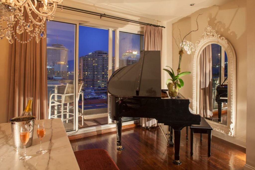 photo of the penthouse at international house hotel, with the baby grand piano centered 