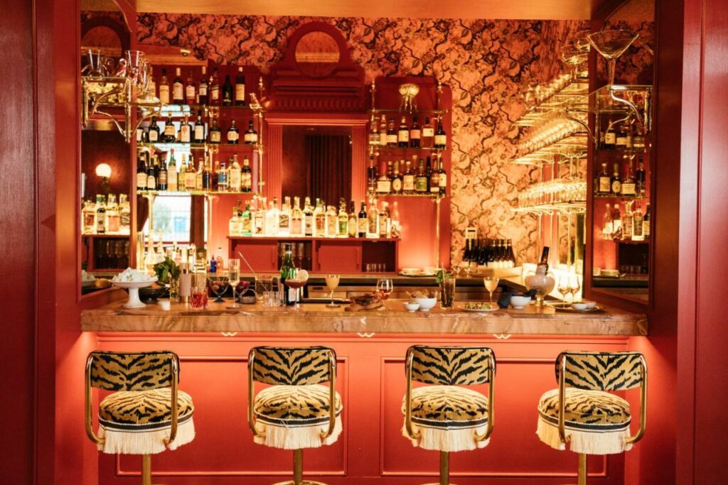 photo of a bar top with cheetah print bar stools at Maison de la Luz