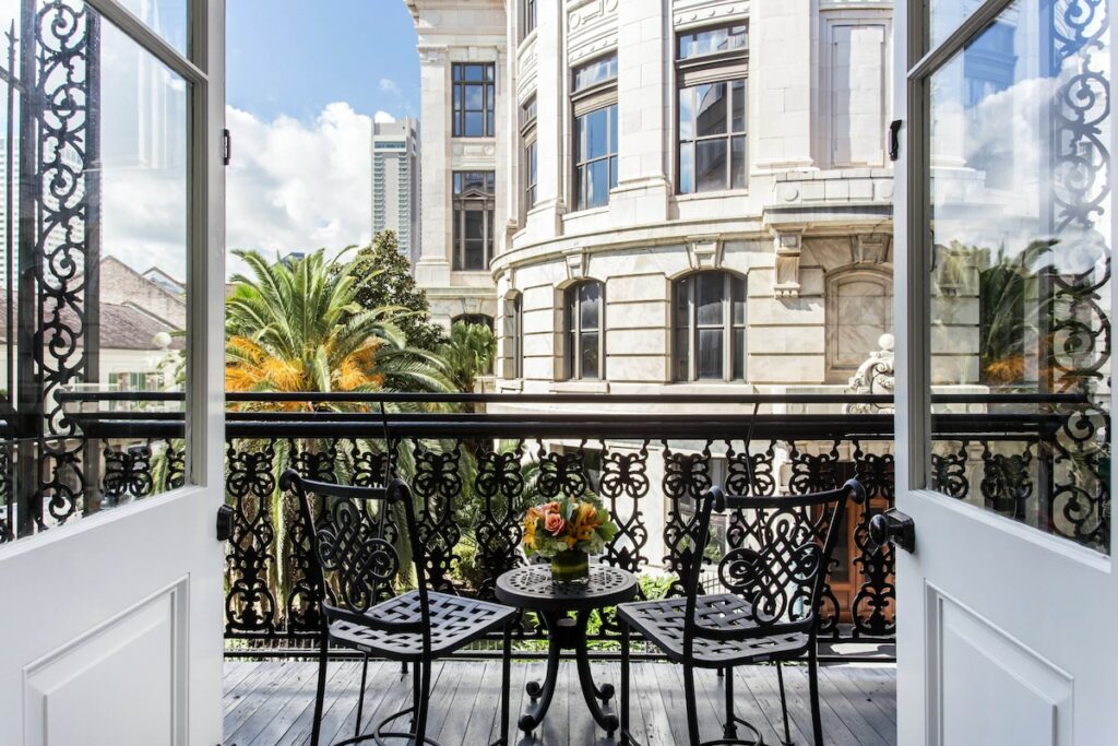 photo of two iron chairs on a balcony at the Omni Royal Orleans hotel 