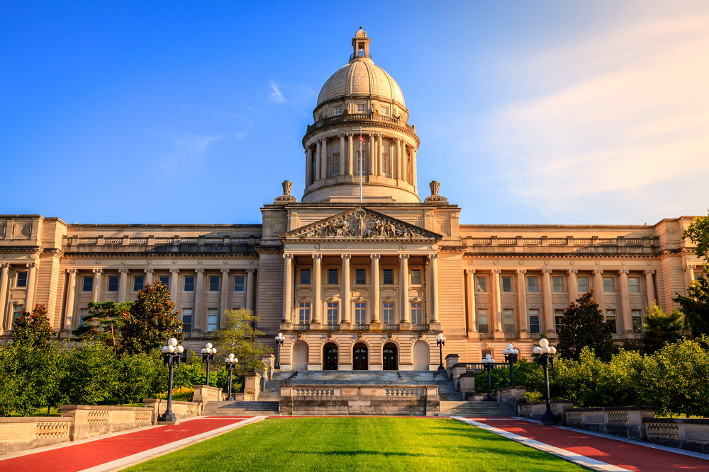 Photo of the Kentucky State Capitol building in Frankfort on a blue sky sunny day.