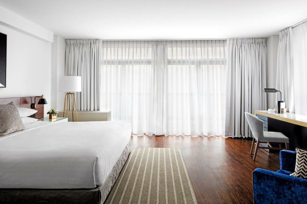 clean and bright room with velvet accents at this great option for best places to stay in Washington DC