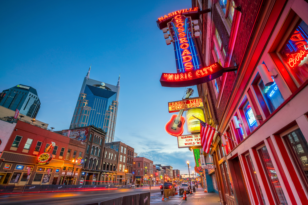 The neon lights of downtown Nashville line the streets as cars zoom by, just encouraging people to stop and stay and explore without fear of where to stay in Nashville.