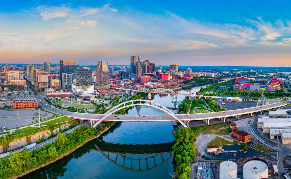 When considering where to stay in Nashville, look at the city as a whole, like in this photo which shows an overhead view of the water, skyline, and more. There are lots of options! 