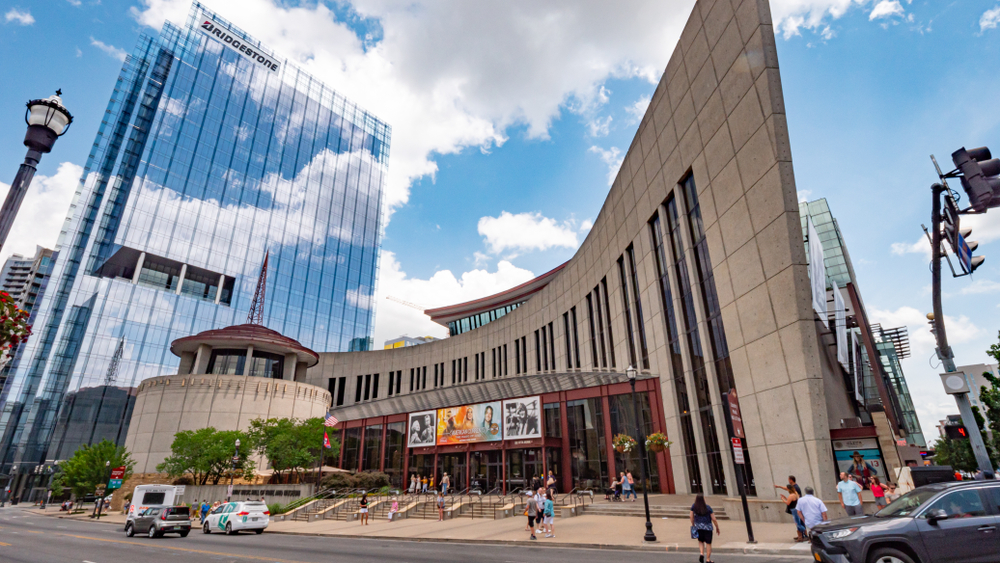 Sobro is where to stay in Nashville because there is much to do, as seen in this photo which shows the Country Music Hall of Fame as crowds gather on the stairs to get inside. 