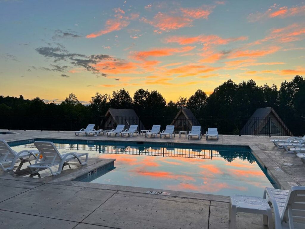 The beautiful sunset by a pool at one of the best family resorts in North Carolina. 