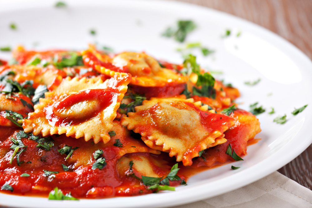 Lobster Ravioli with red sauce on the top 