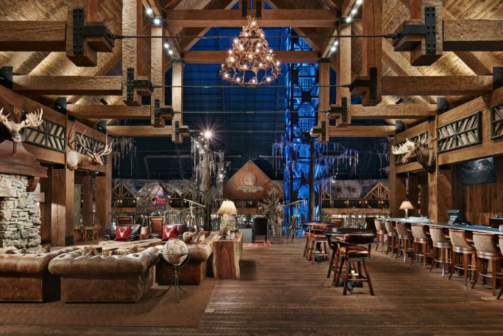 The big Cypress Resort is one of the best resorts in the South: this interior design creates a country atmosphere with antlers, chandeliers, and ceiling high windows. 