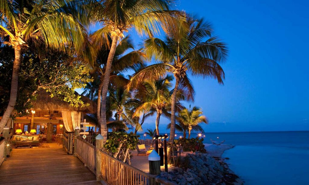 The Little Palm Island Resort is literally on an island, making it one of the best resorts in the South. This photo shows a walkway during the evening that leads to a private, bungalow type room. 