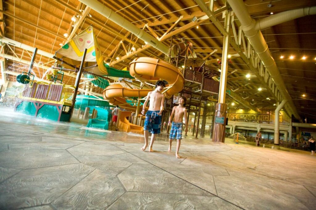 Two kids walk away from the indoor water park at the Great Wolf Lodge Concord, one of the best resorts in the South. 