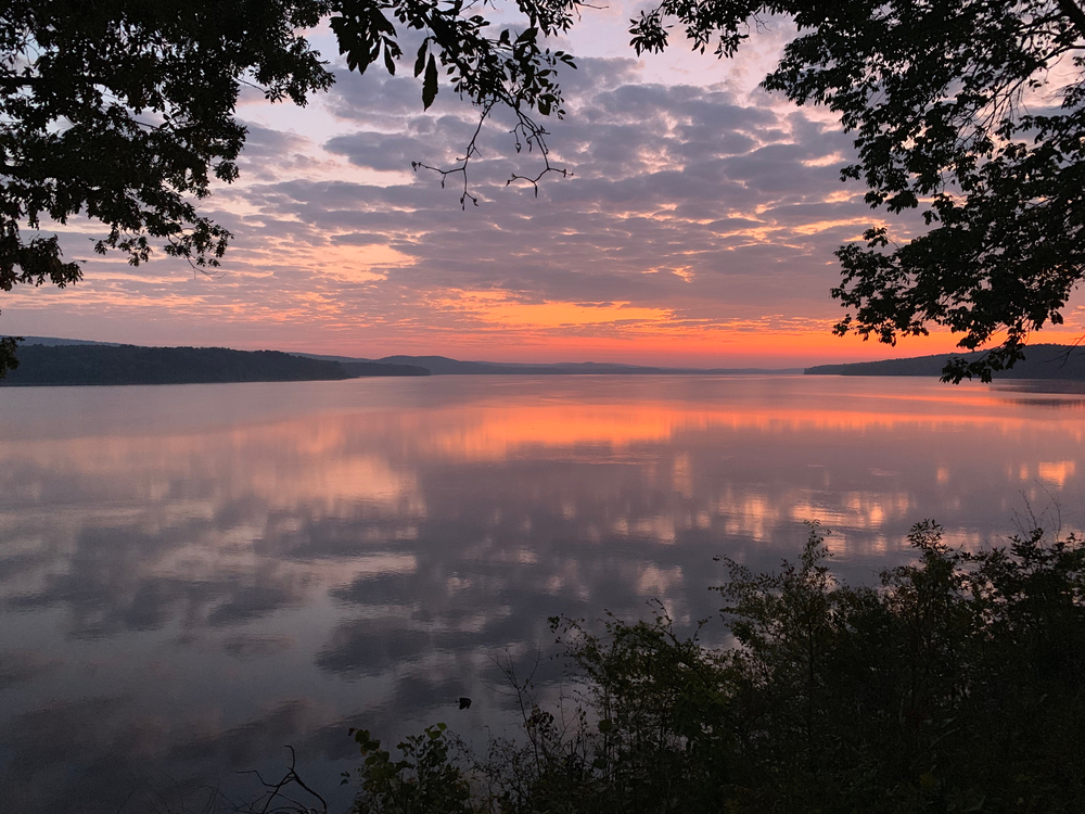photo of maumelle lake at maumelle campground at dusk, with overcast clouds 