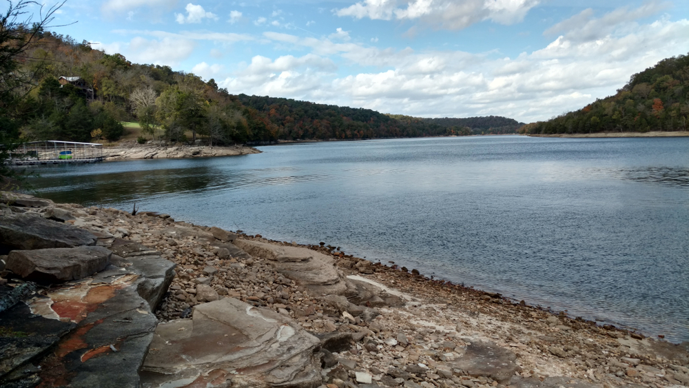 photo of beaver lake at prairie creek campgrounds with a rock shore, one of the best places for camping in Arkansas