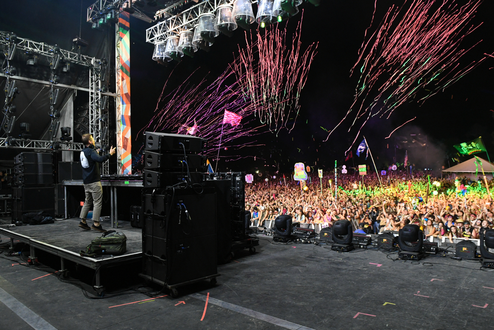 Photo from the stage at Bonnaroo looking out at a partying crowd.