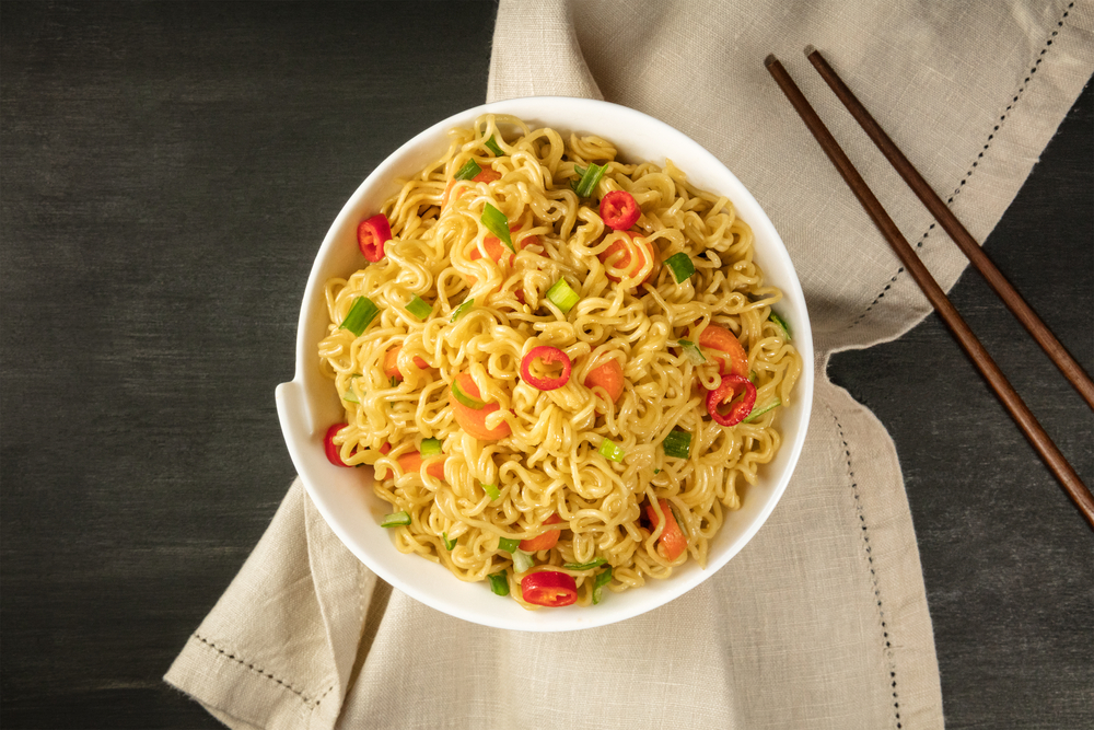 A fresh noodle bowl with peppers and shrimp 