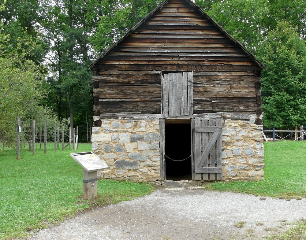 heritage building and apple house located at one of the things to do in Cherokee, visit the mountain farm museum and explore the property!