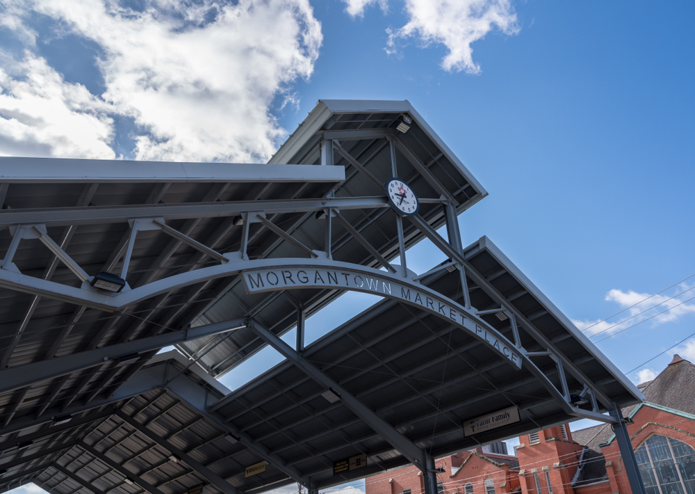 the shelter that covers the farmers market in morgantown, a sign reads morgantown market place