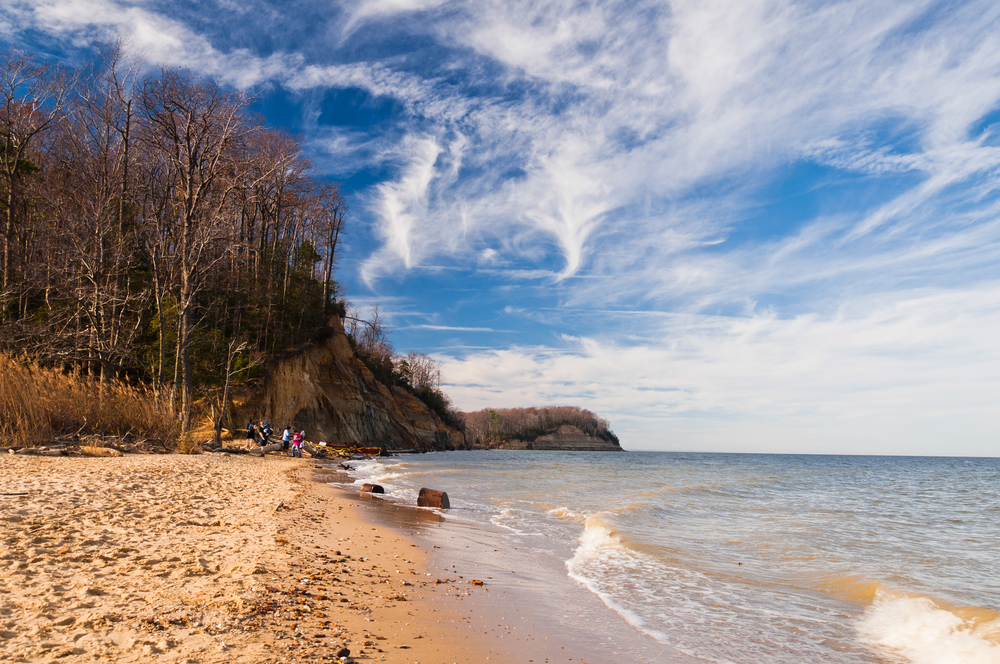 a beautiful beach with cliffs