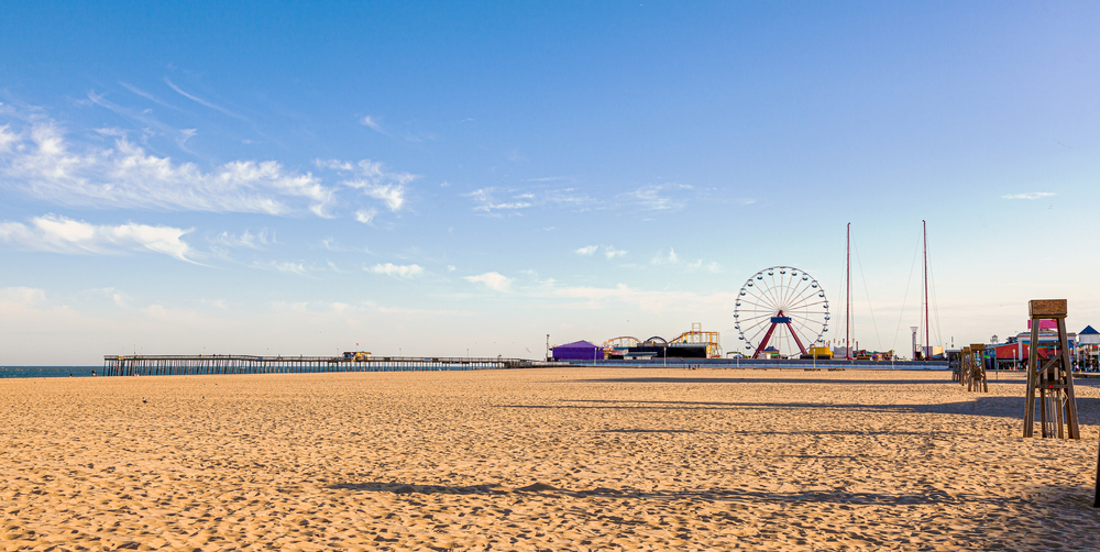 beach with ferris wheel at ocean city maryland