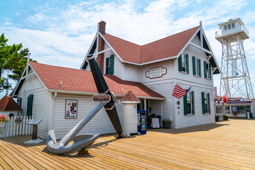  Life Saving Station Museum on the Boardwalk on a sunny day. One of the best things to do in Ocean City. 