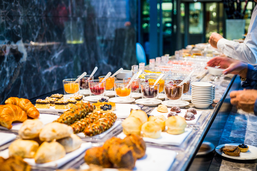 this buffet features an endless line of pastries, jams, juices, and more !