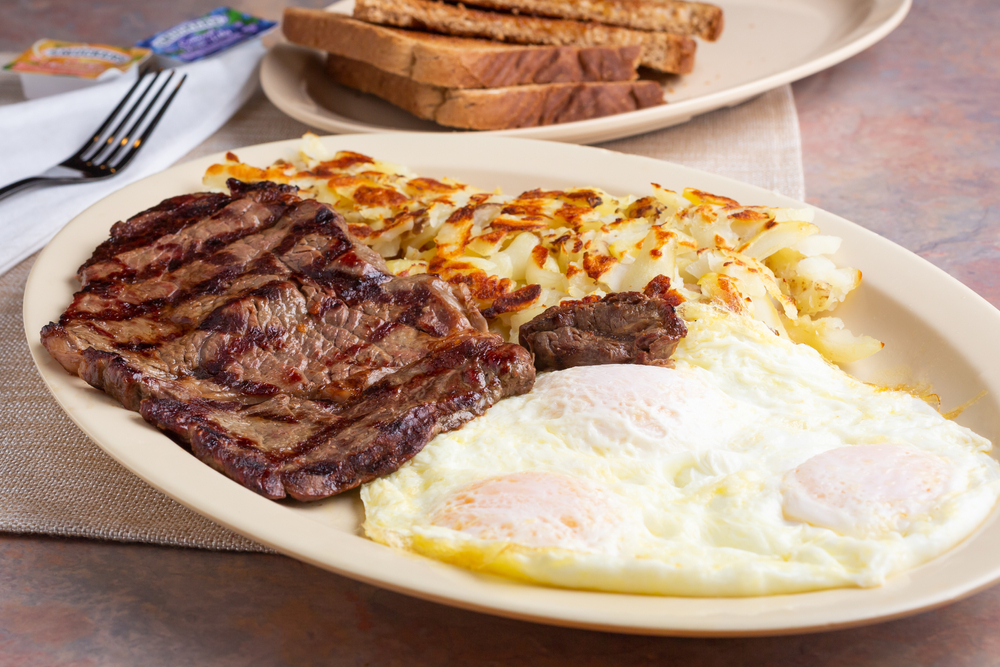 Steak, fried eggs and a side of hash.