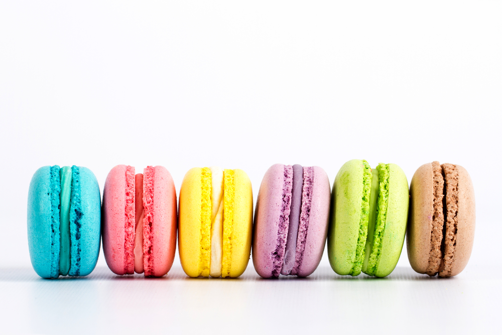 Blue, pink, yellow, purple, green and brown macaron at Common Bond Bistro and Bakery, where they have the best brunch in Houston. 